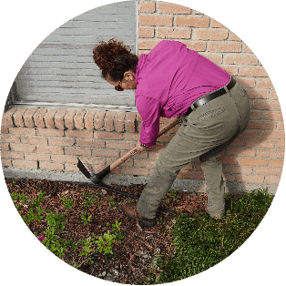 Image of a women working in the garden